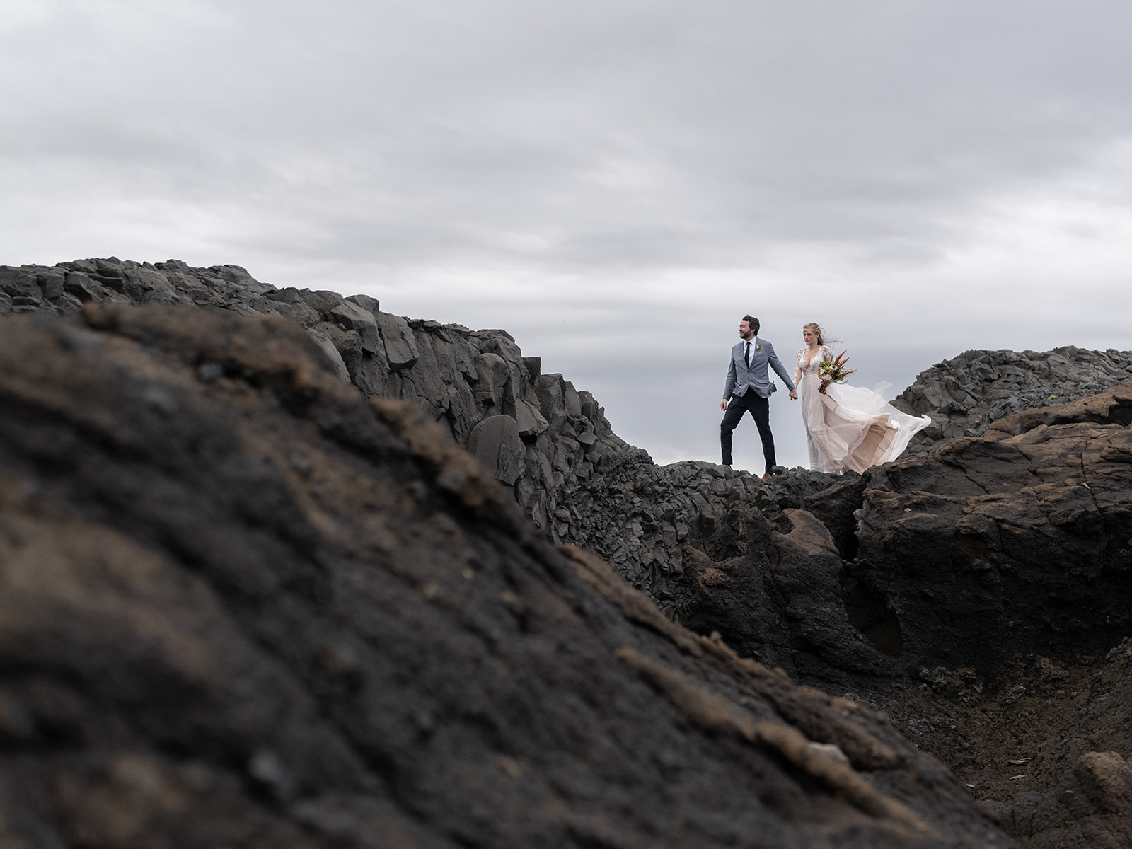 Bride and groom exploring Iceland during their Elopement