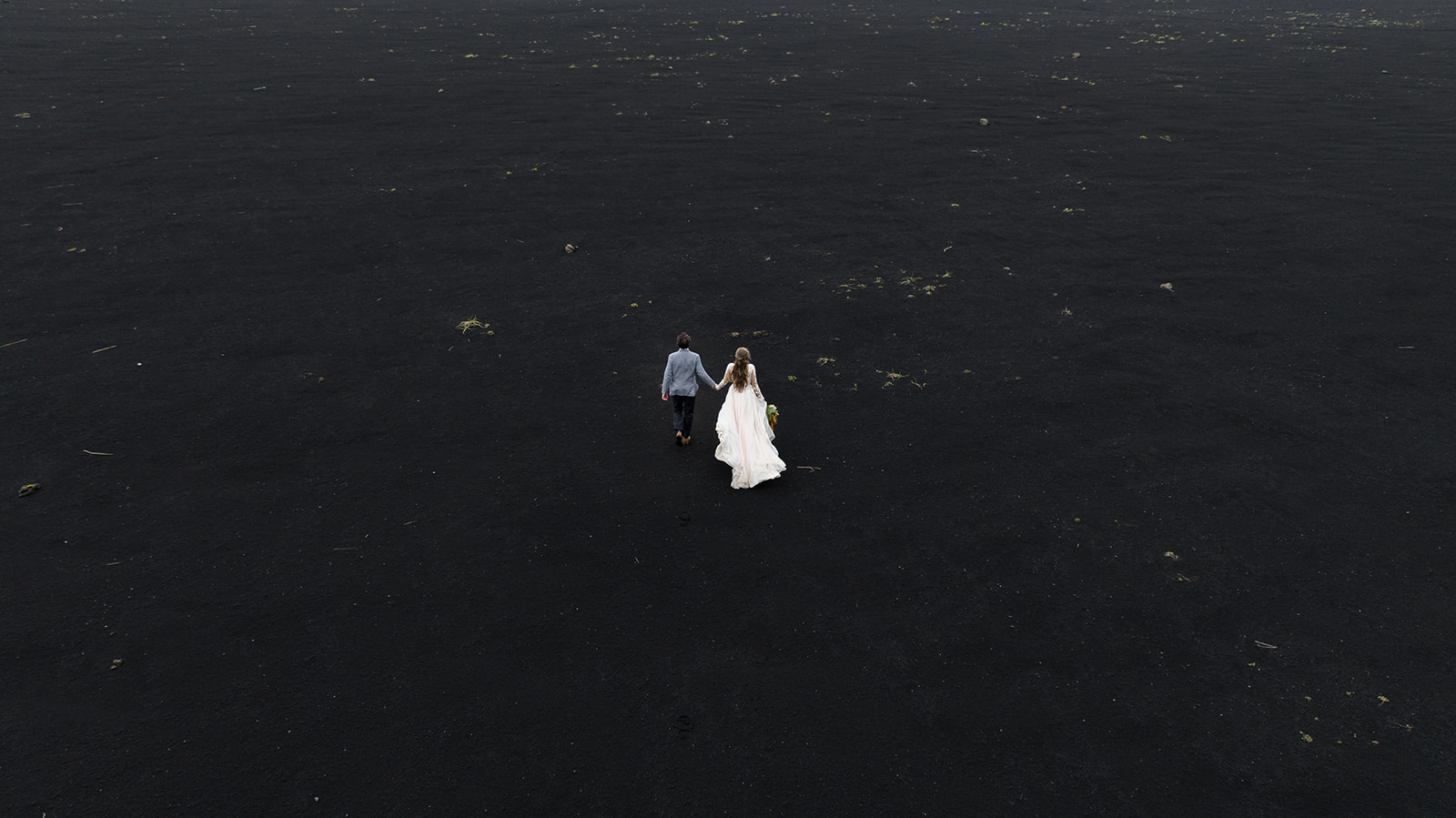 aerial shot of a Bride and Groom eloping in iceland 