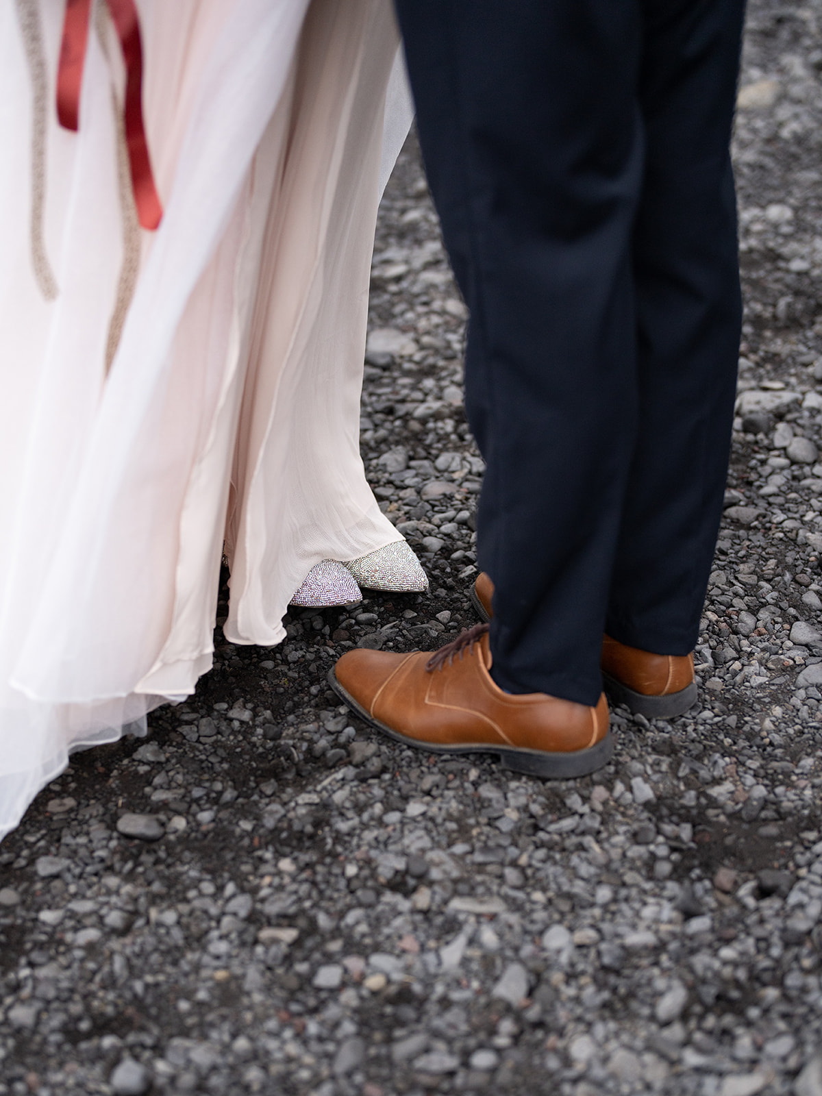 Bride and groom eloping in Iceland at skogafoss waterfall