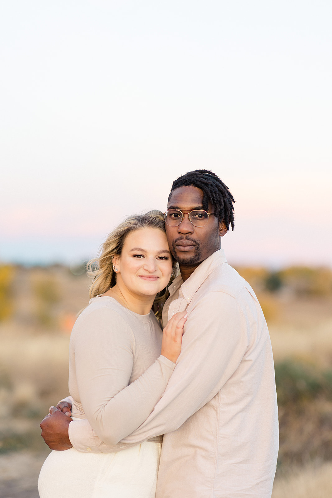engagement photo of couple at sunset in Westminster Colorado