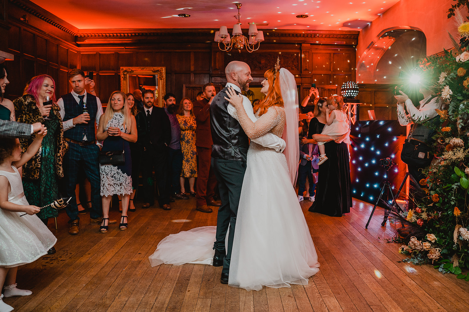 A bride and groom enjoy a first dance during their wedding at Lanwades Hall