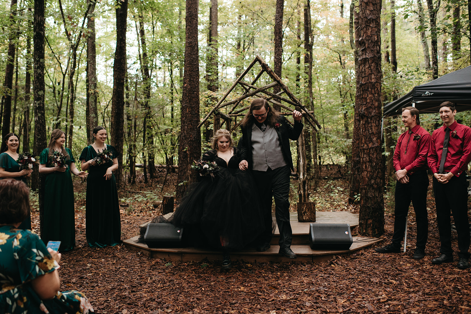 A rainy, gothic inspired wedding at Timberlake Earth Sanctuary in Whitsett North Carolina. 