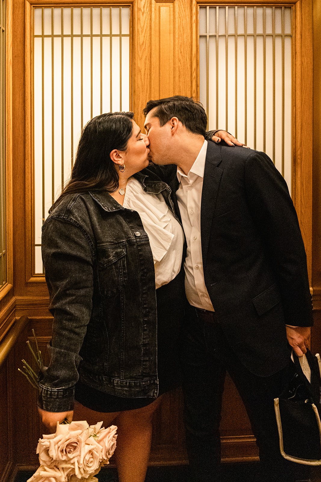 couple photos in sf city hall elevator