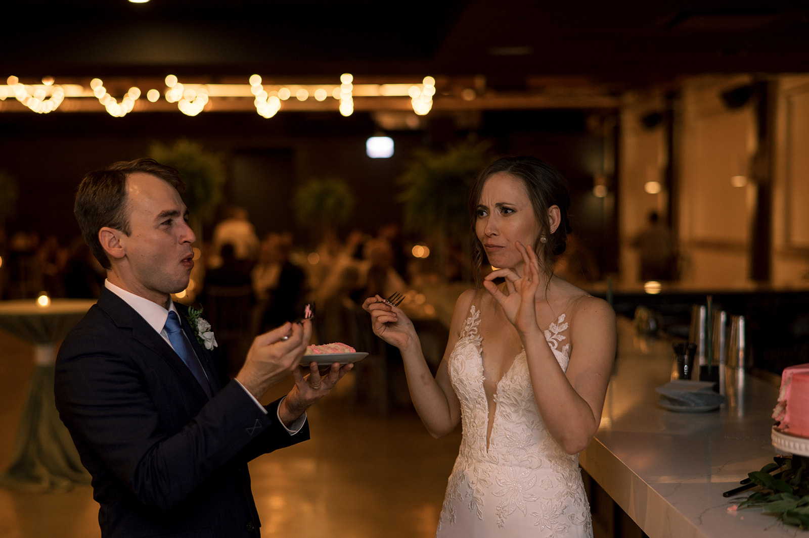 Bride and groom eat cake at Walden Chicago