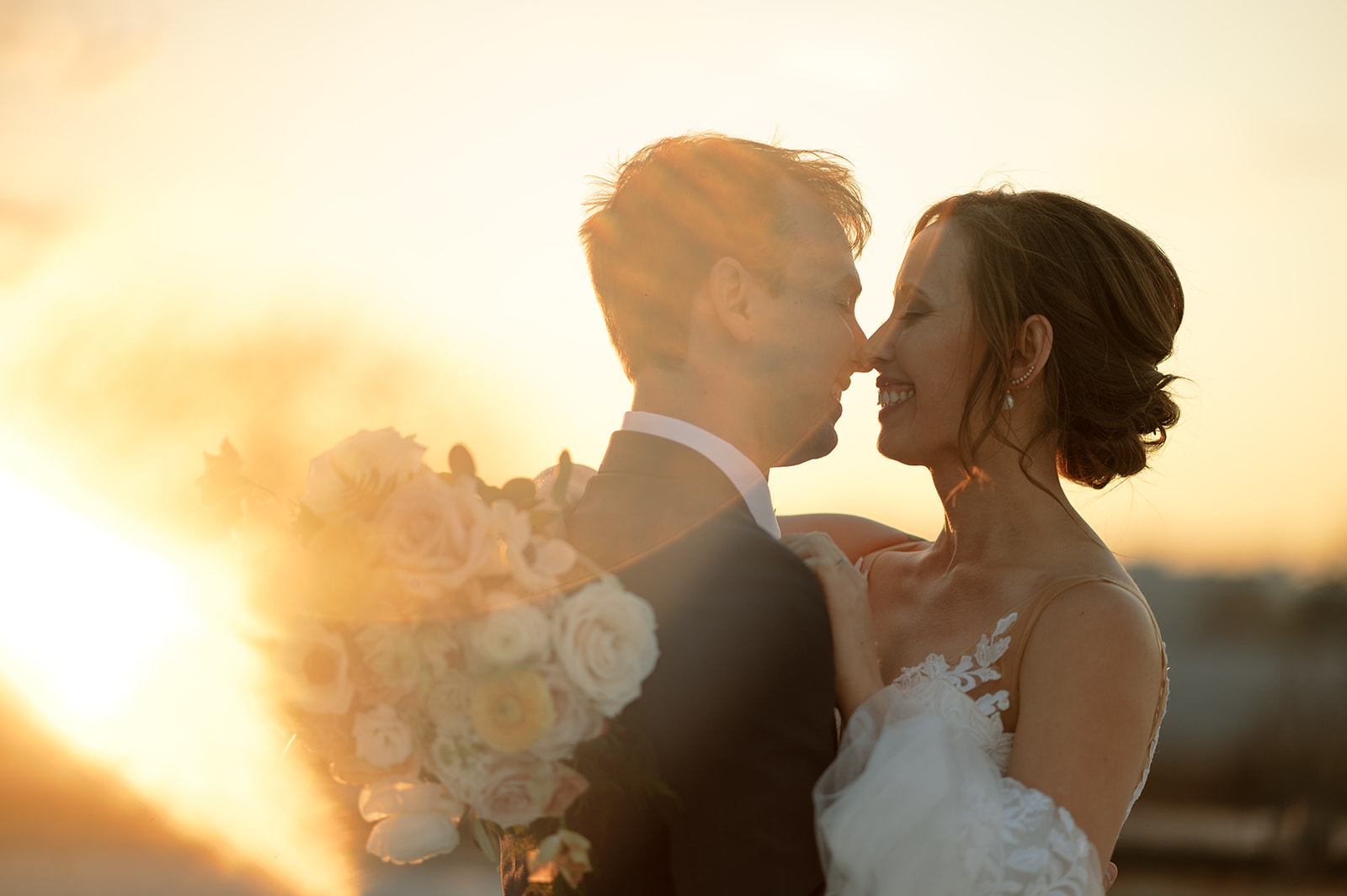 Bride and groom on rooftop of Walden Chicago at sunset with Chicago skyline in the background