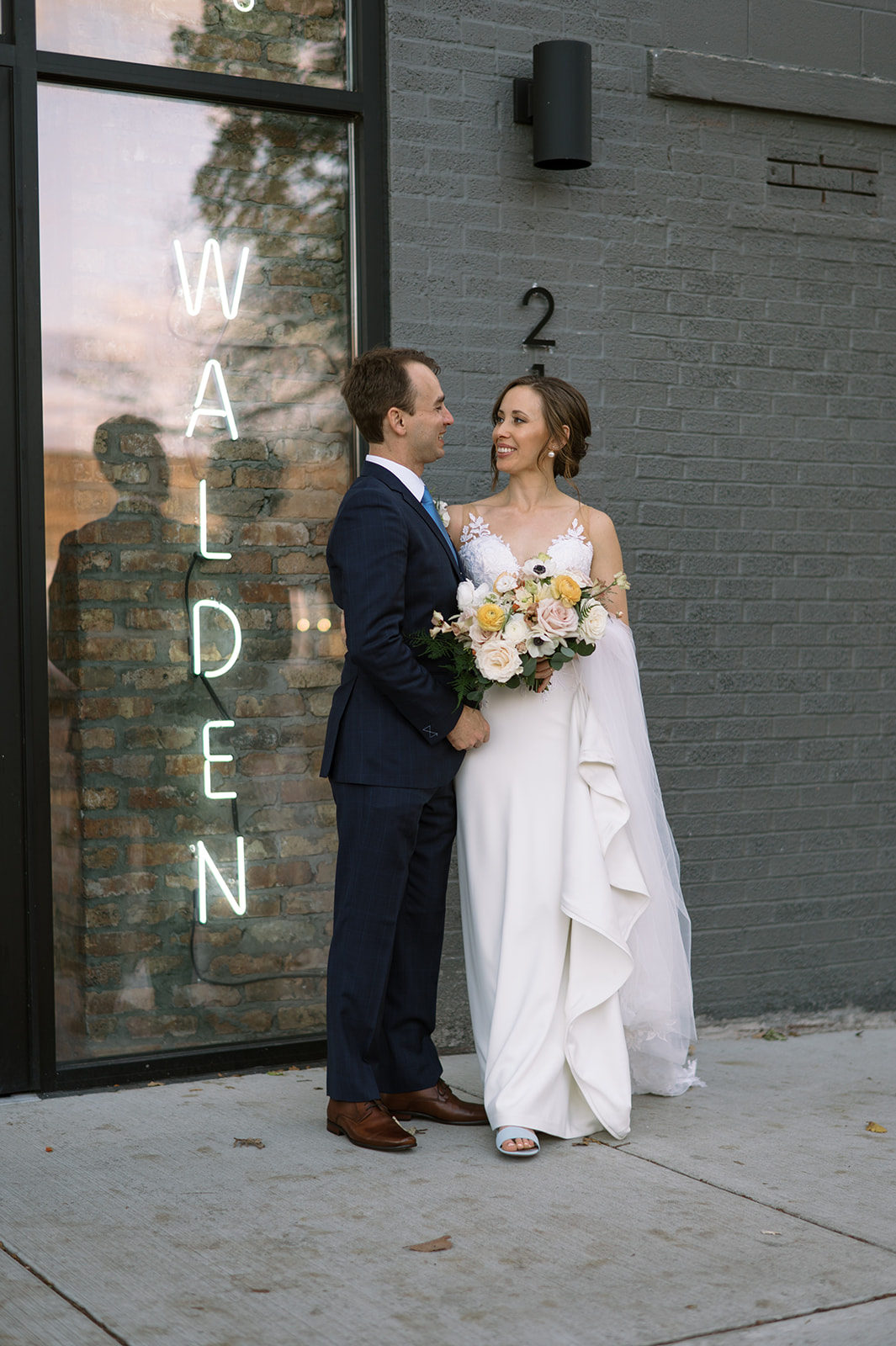 Bride and groom standing outside at Walden Chicago