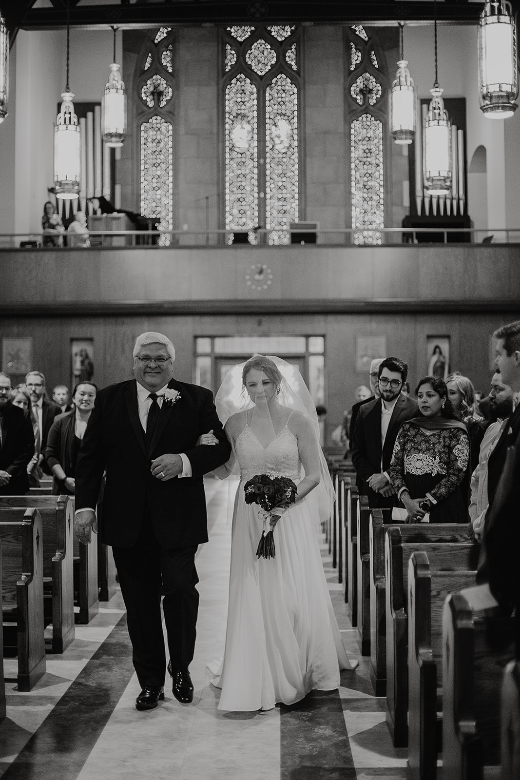 father walks daughter down the aisle to marry at church