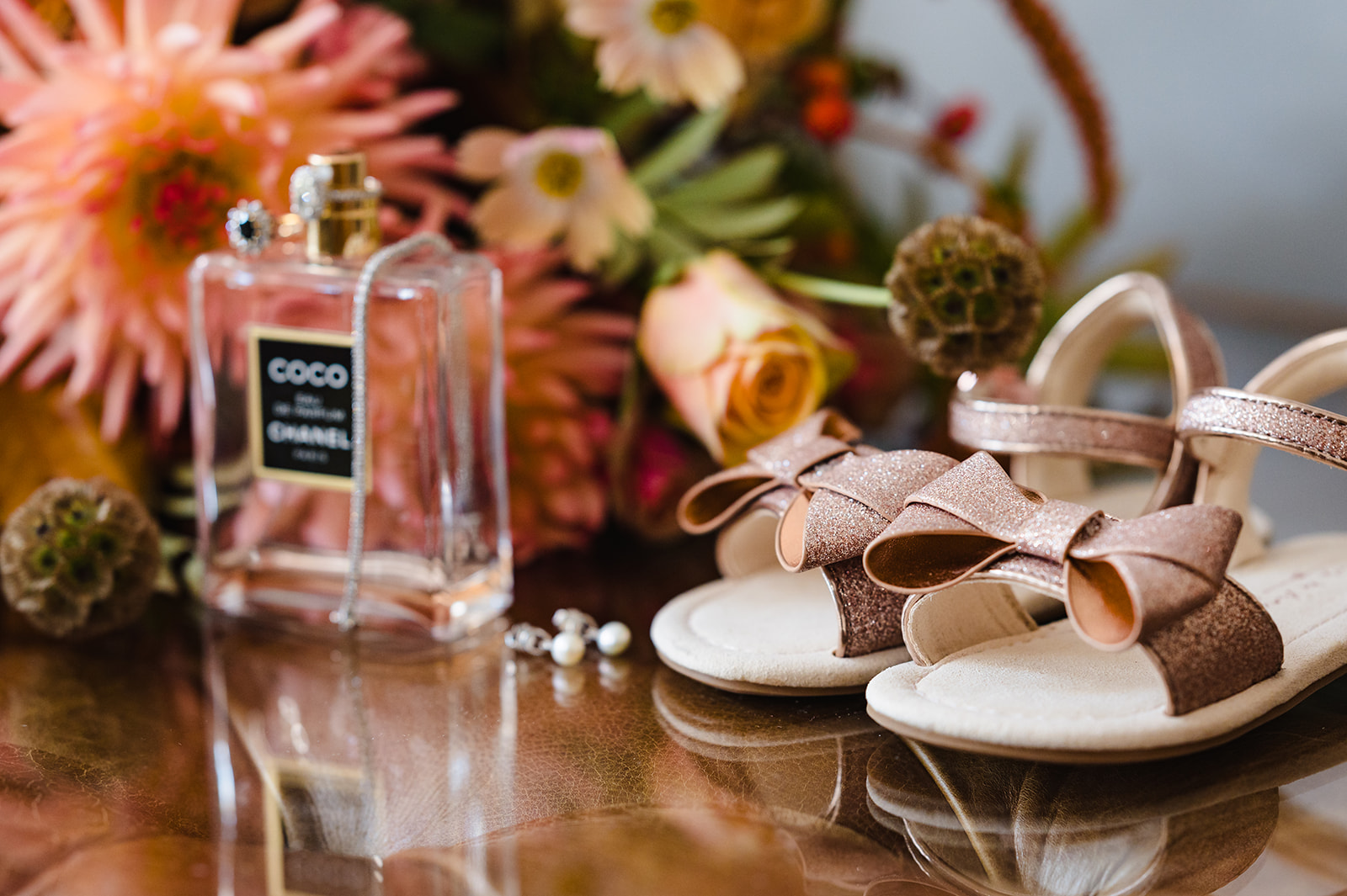 flower girl shoes with autumnal wedding bouquet