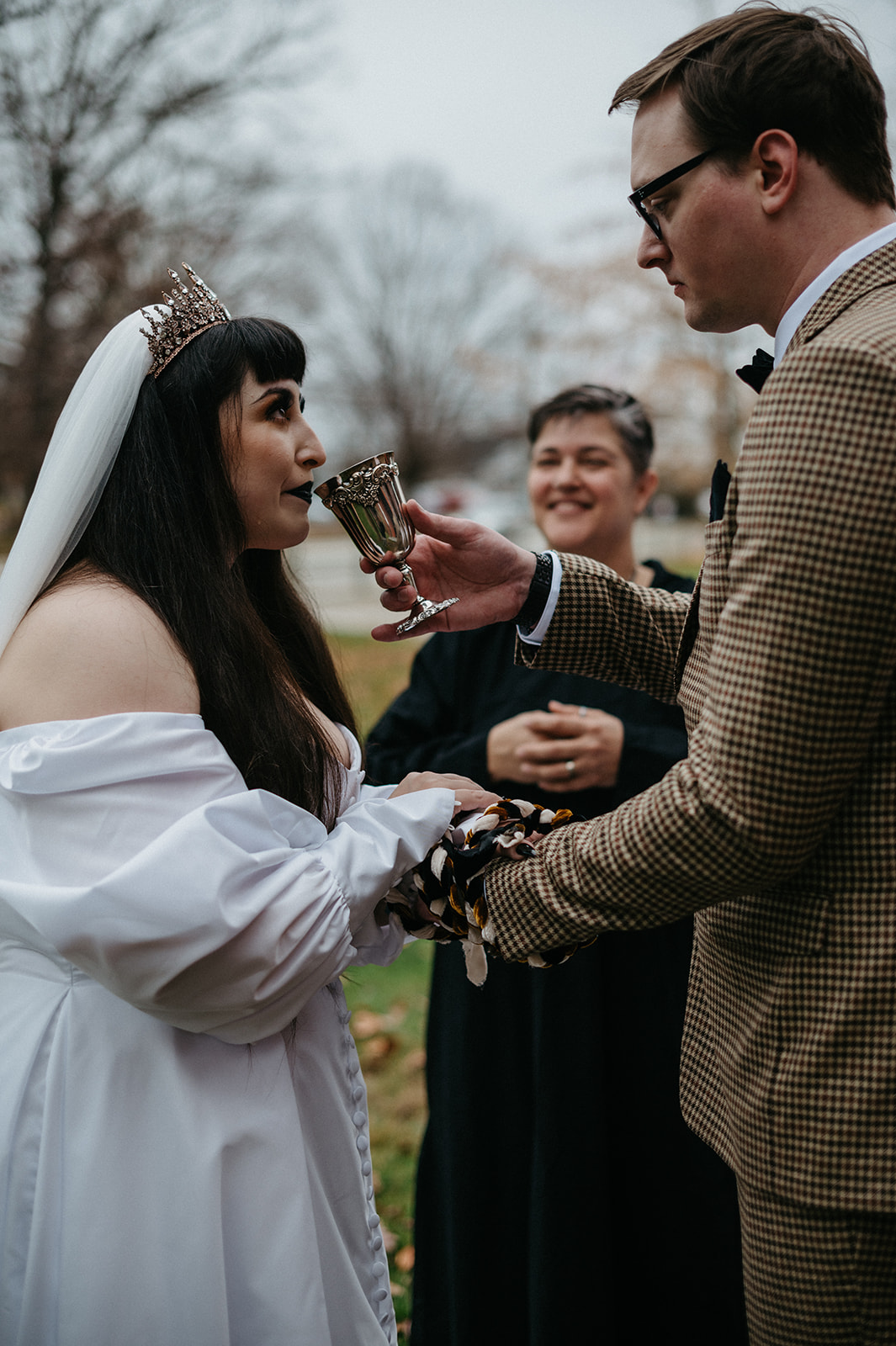 Bride and groom share wine during pagan ceremony at Roseland Cottage Elopement