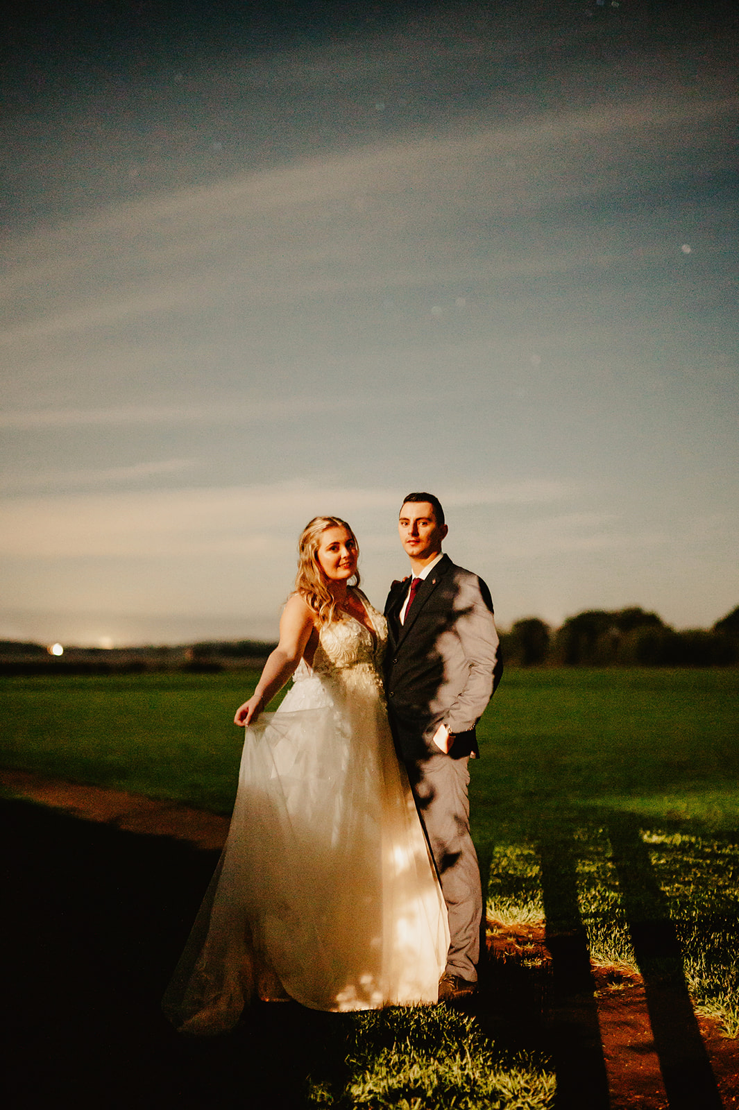 lowlight wedding portrait at pentney abbey with the stars in the sky