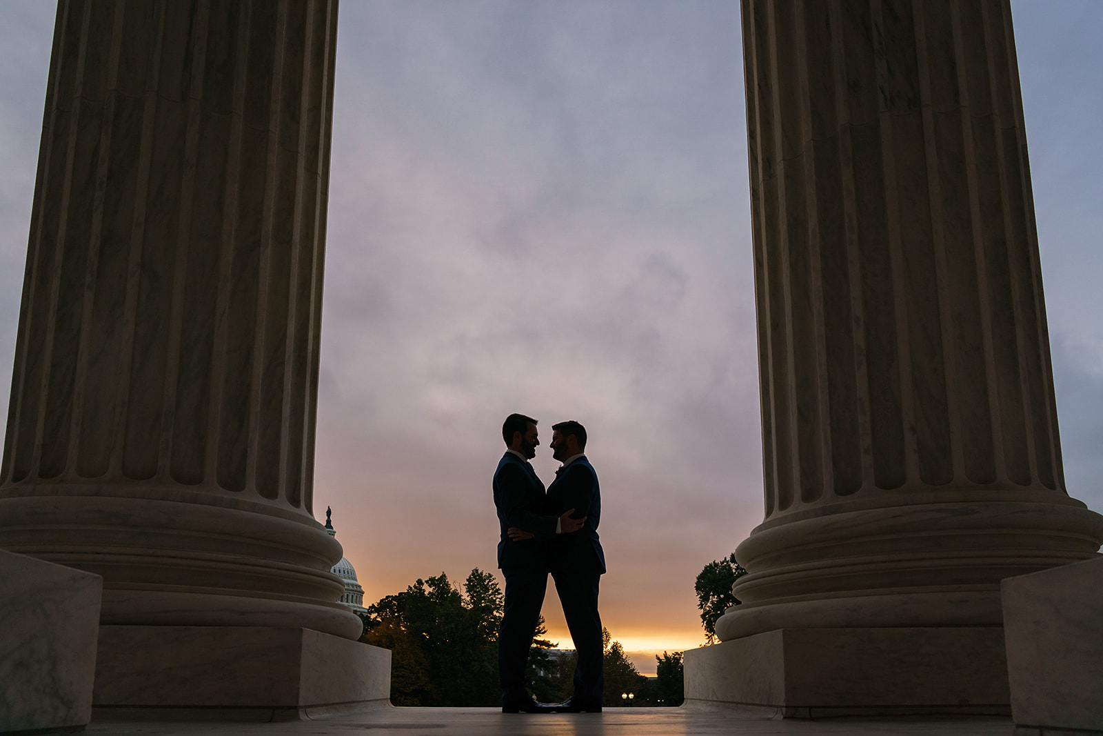 Evening silhouette of wedding couple at Supreme Court