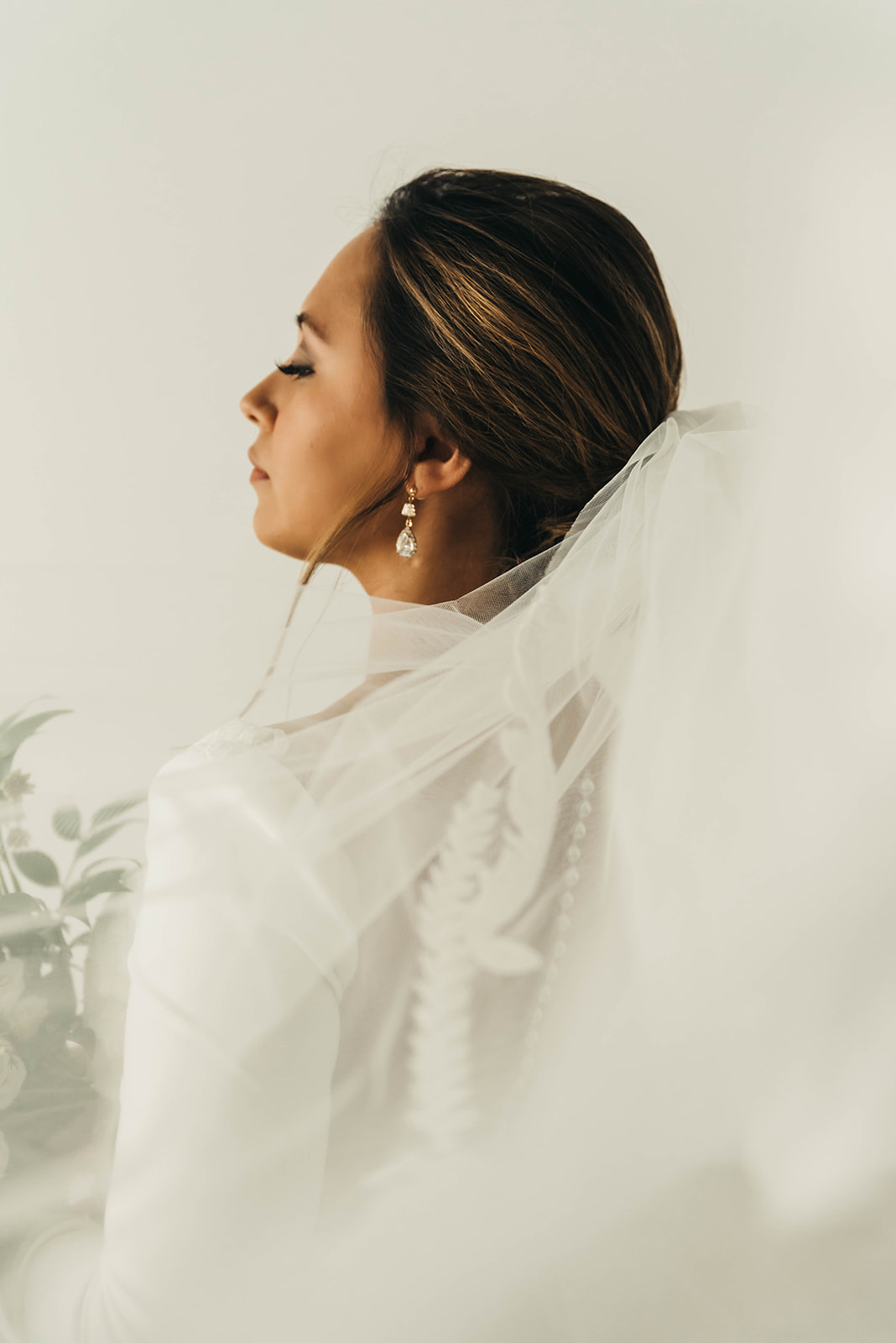 bride dress and a bouquet and veil