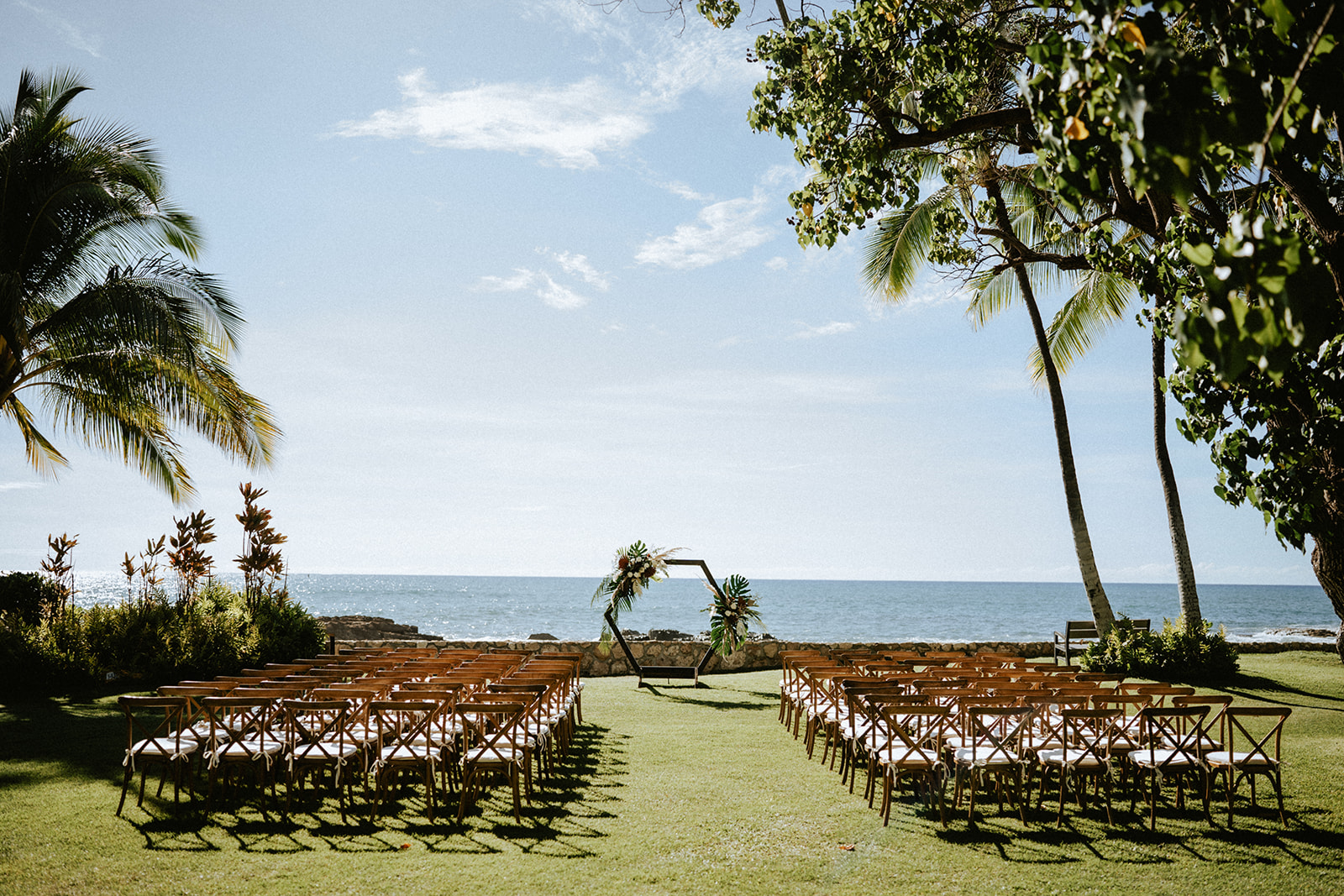 Wedding ceremony set up at the beautiful Lanikuhonua on a sunny day