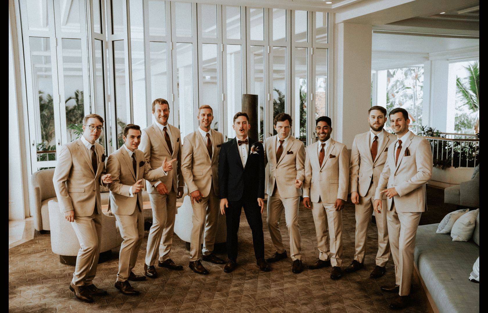 Groomsmen and Groom showing off that they can dance better than the bridesmaids