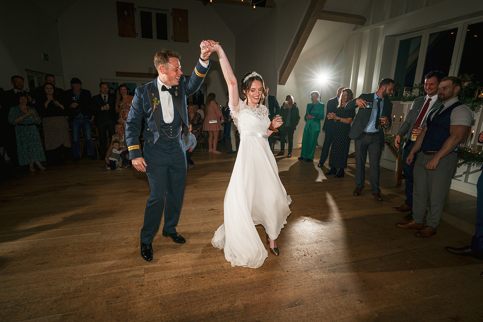 military groom and his bride photographed during their first dance, Hyde House, cotswolds