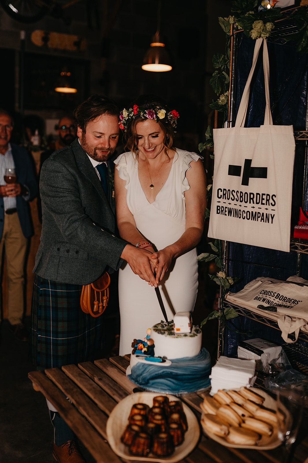 Couple cut the cake at Crossborders brewery taproom