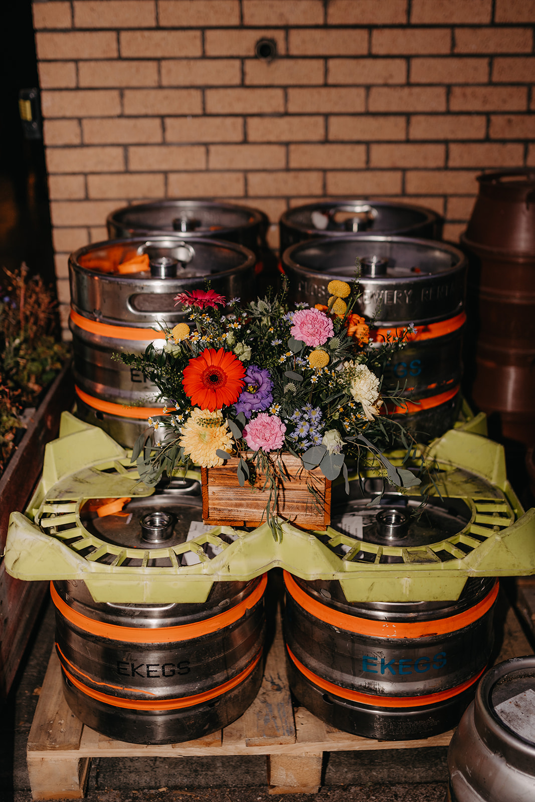 Table centre piece sits on kegs at Crossborders Brewery taproom