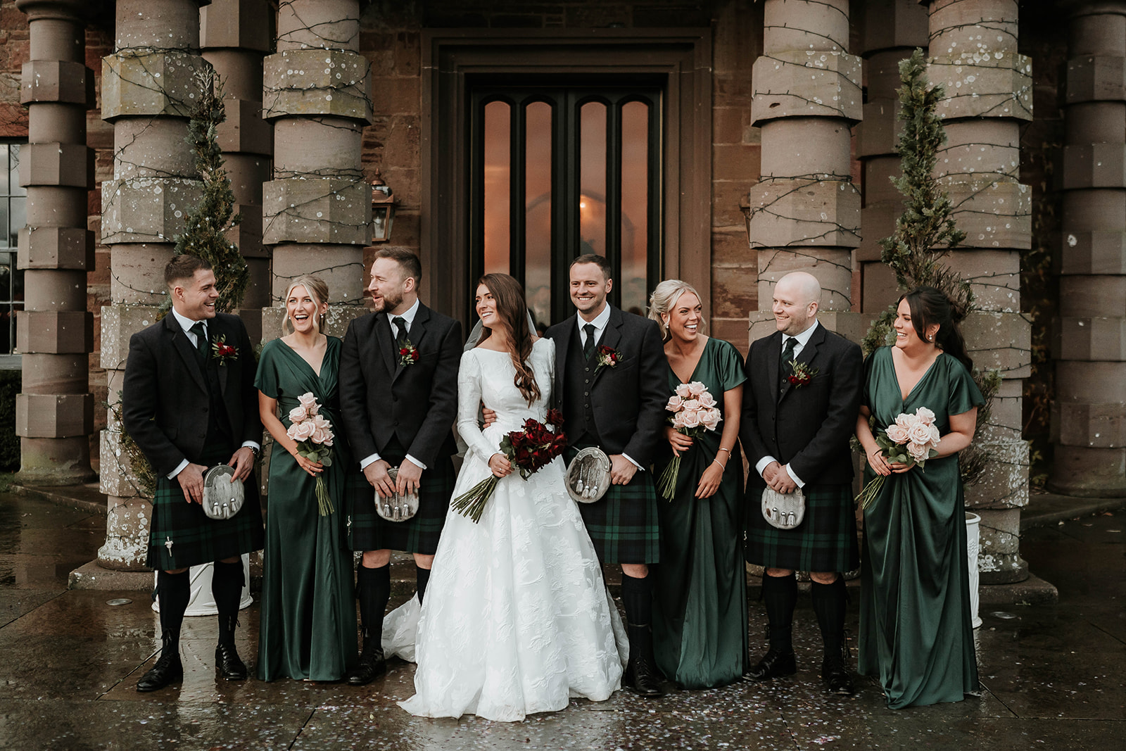 A Bridal party laughing together at Fasque House