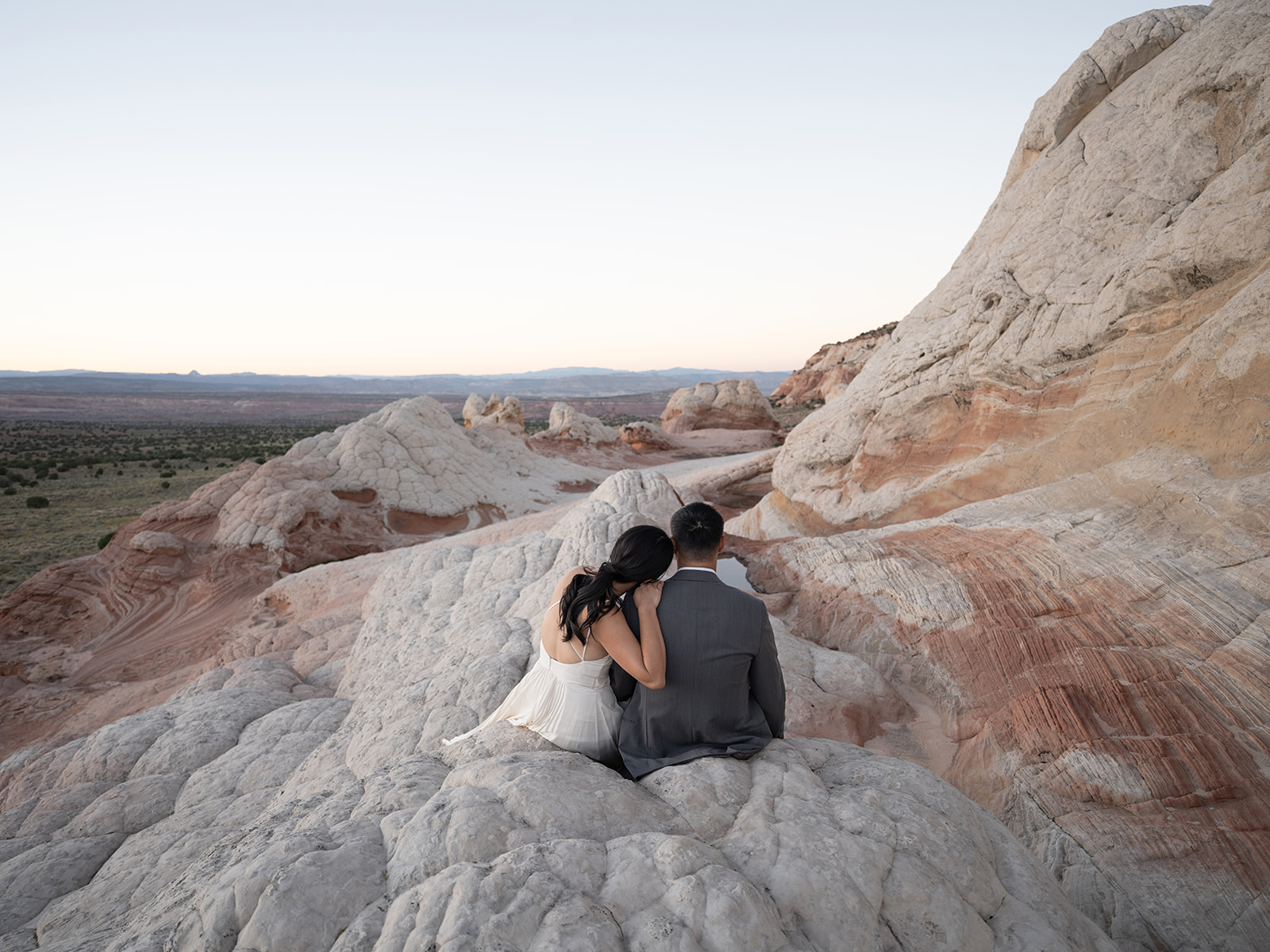 Eloping in the secluded and remote location of White Pocket, Arizona with beautiful views of the Vermilion Cliffs