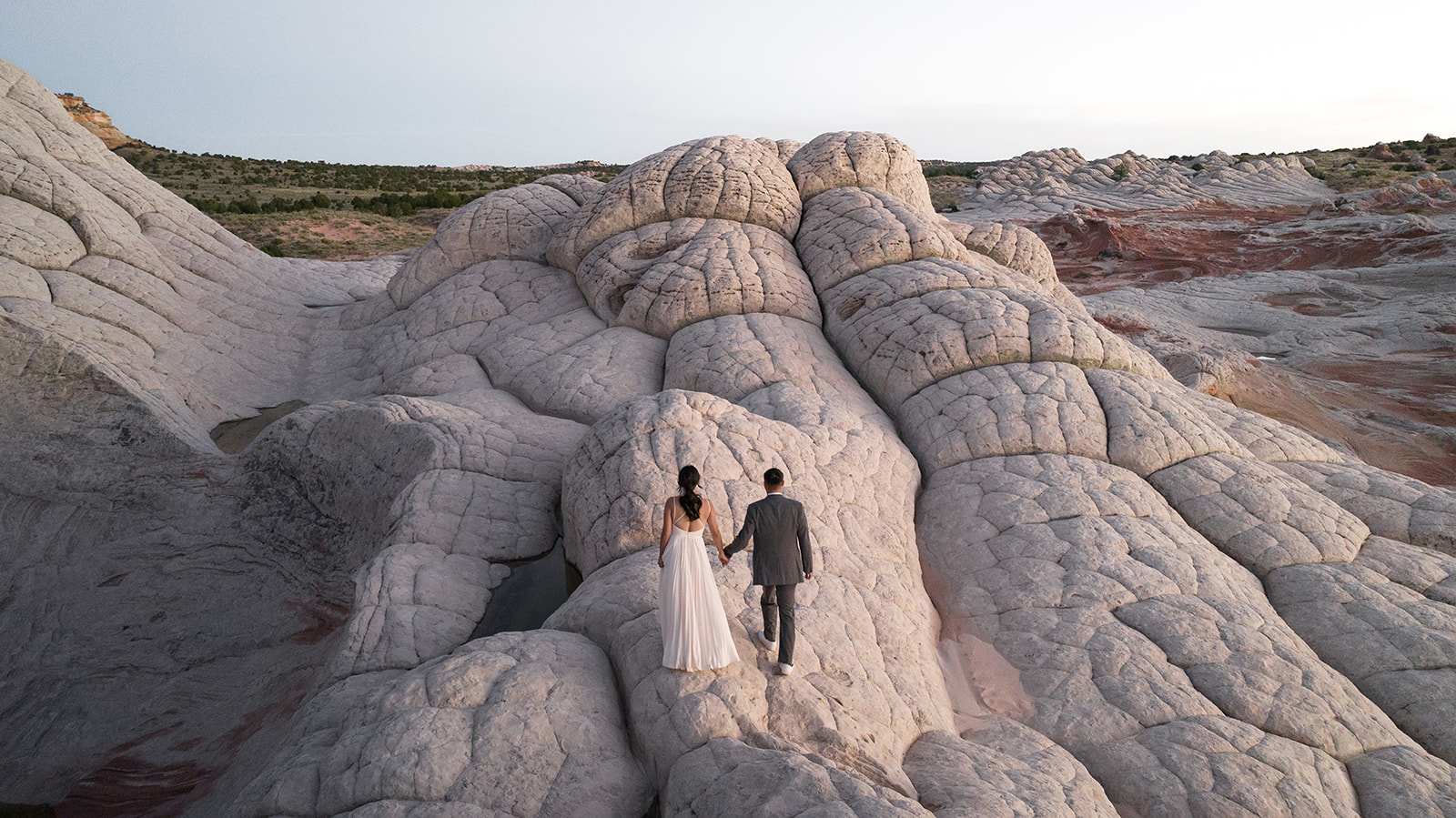 Couple Eloping on the Domes of White Pocket Arizona 