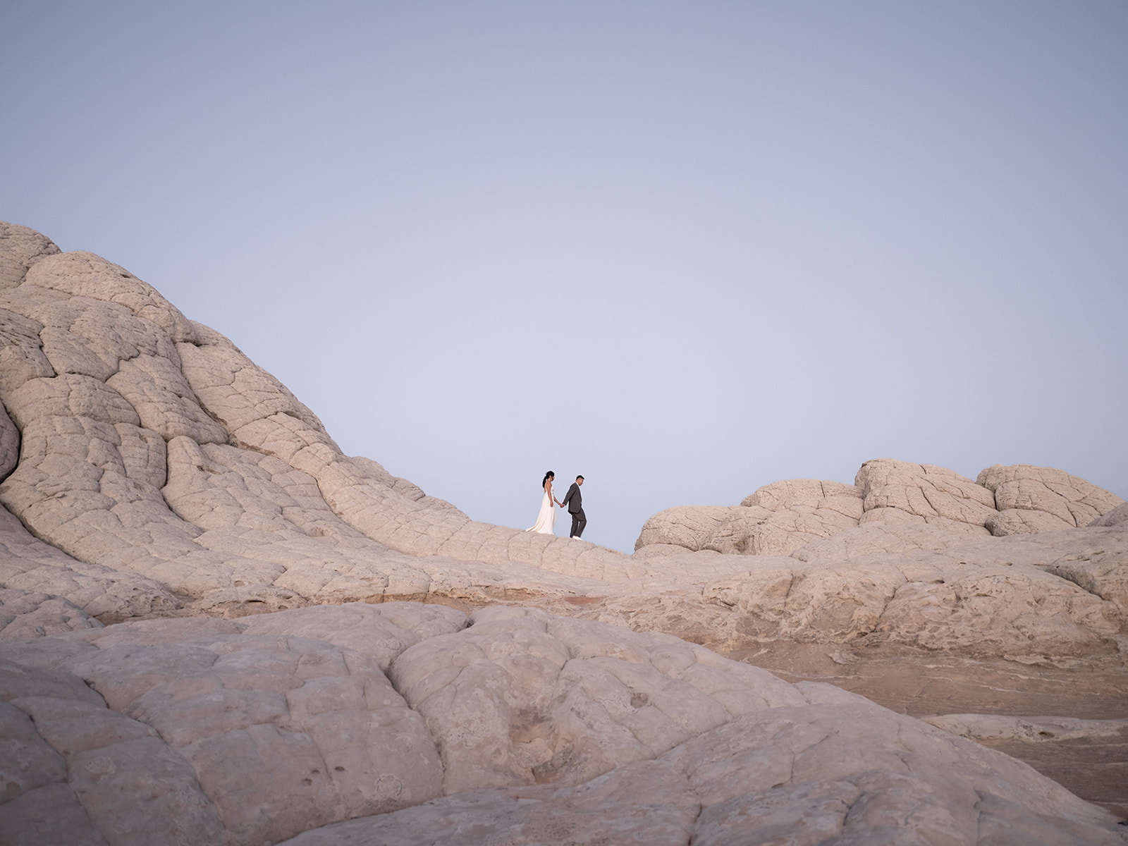 Elopement pictures taken during Blue Hour in White Pocket Arizona 