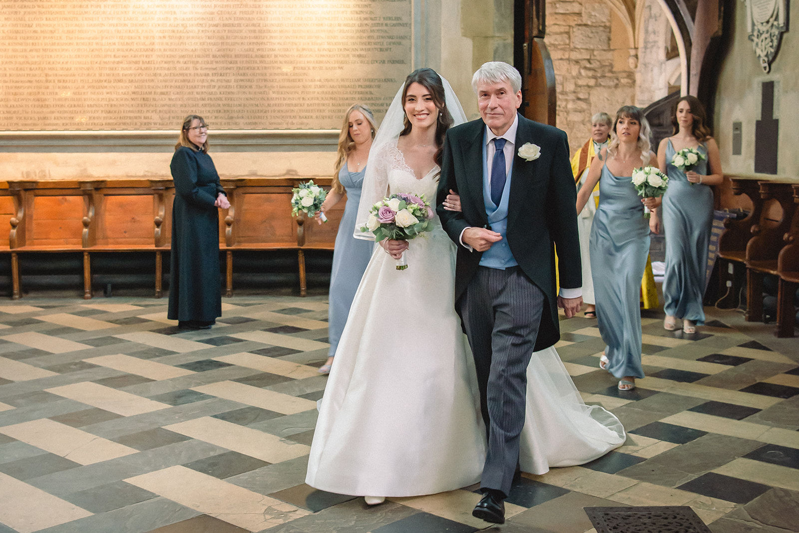 Katherine escorted by her father inside the New College Chapel