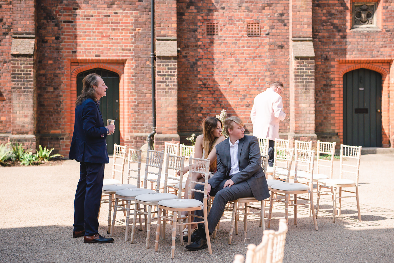 Guests waiting for Nikita and Chris's wedding ceremony at the Fulham Palace