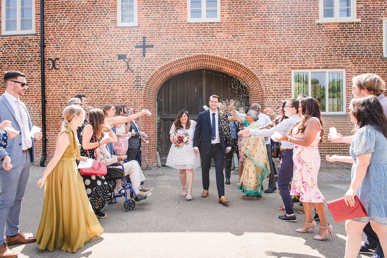 Nikita and Chris's exit at wedding ceremony at the Fulham Palace