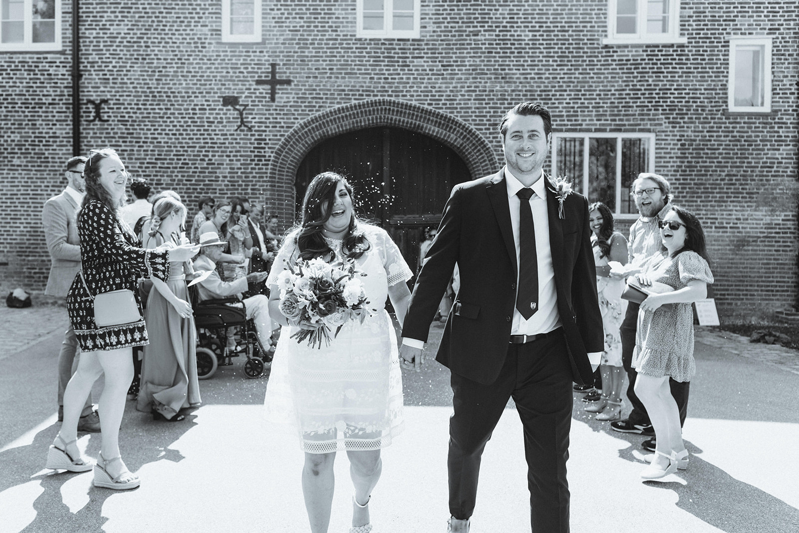 Nikita and Chris's exit at wedding ceremony at the Fulham Palace