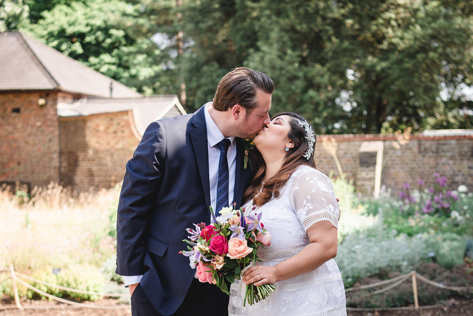 Nikita and Chris's share kiss during the wedding ceremony at the Fulham Palace
