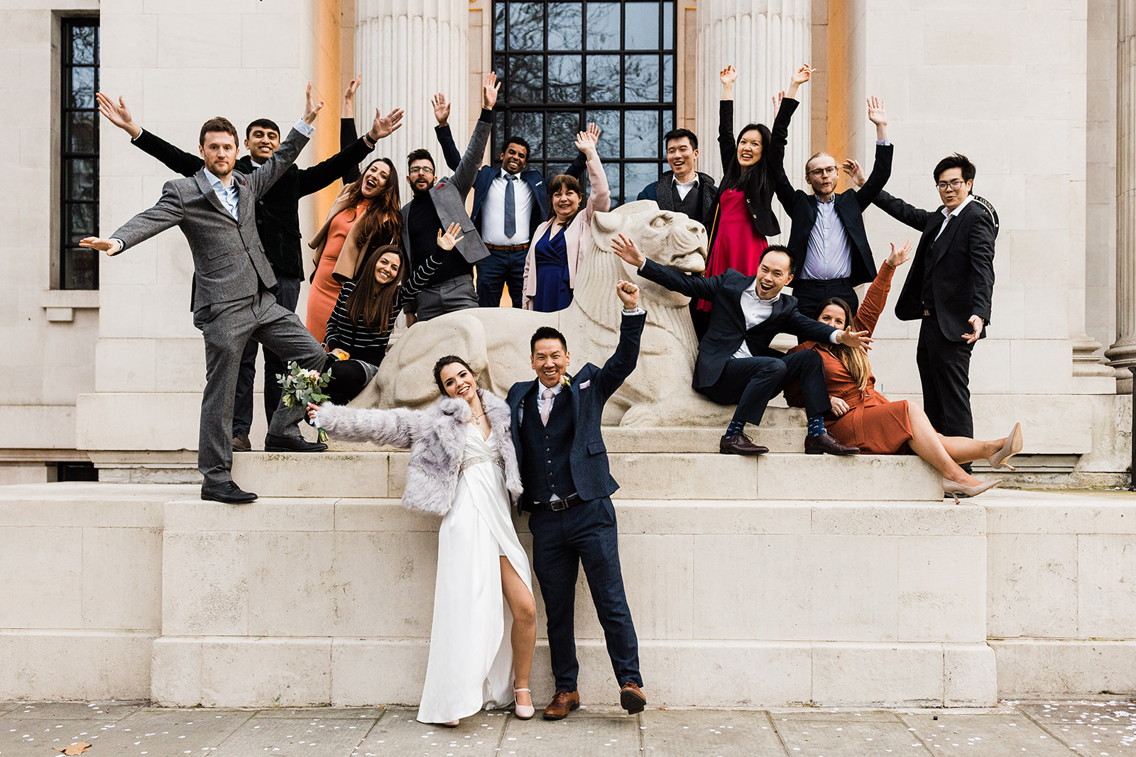 couple and wedding guests at Marylebone Town Hall