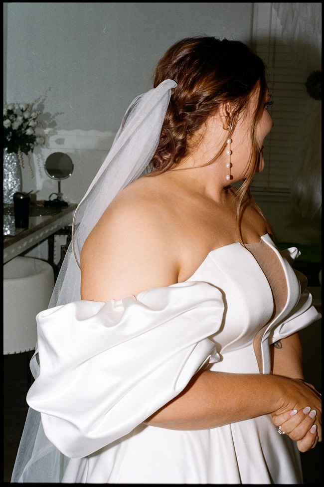 medium format film bride in her dress custom sleeves and film border