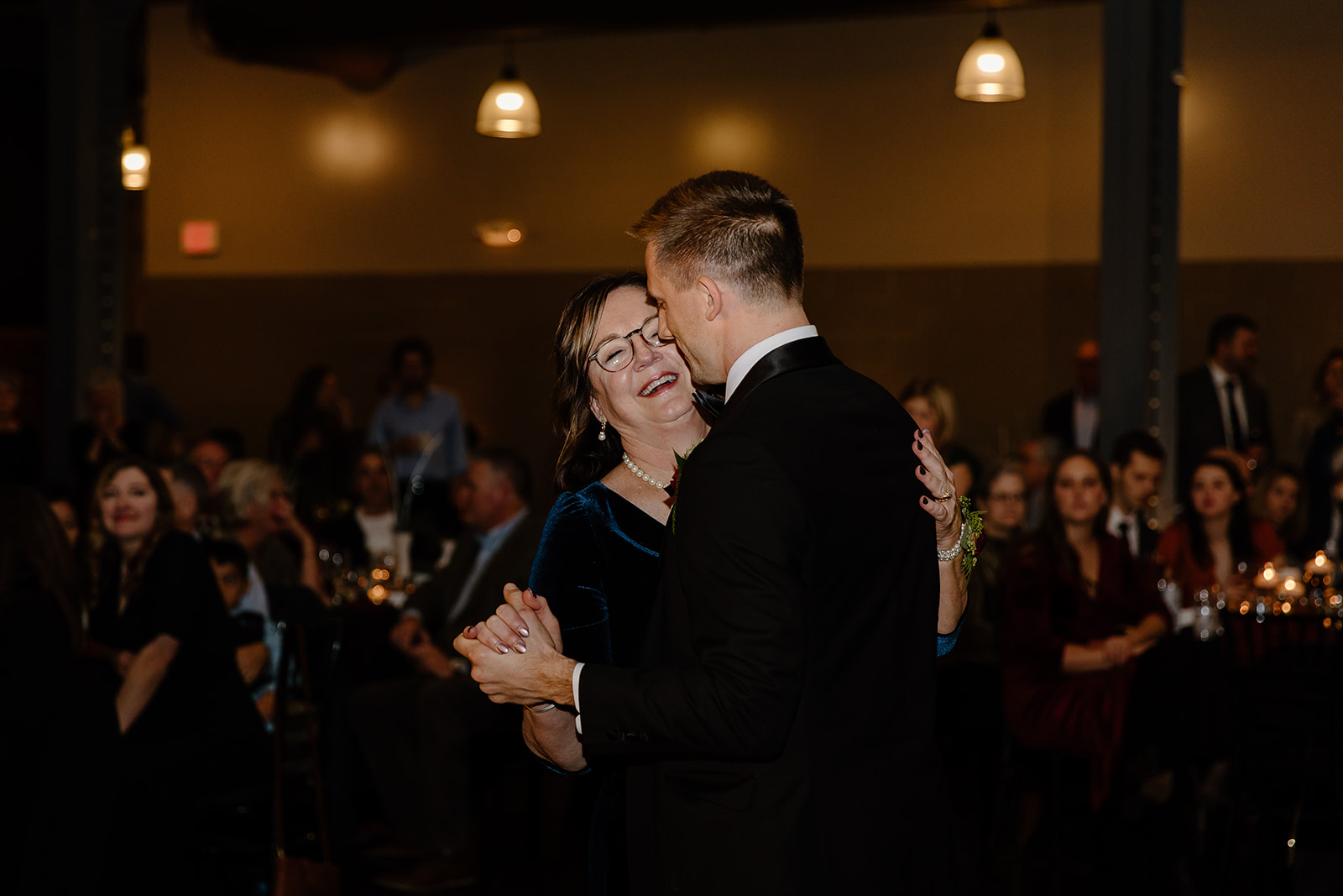 Groom and his mother dancing on the dance floor