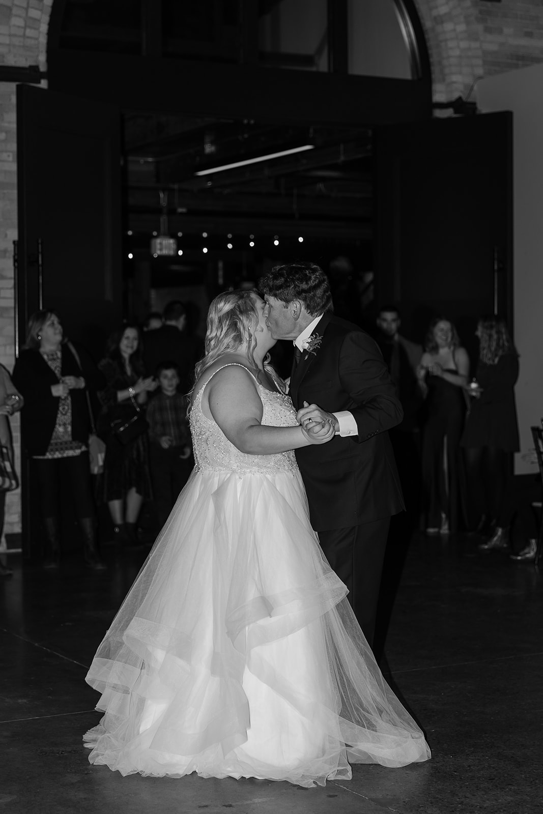 Bride and her father dancing on dance floor