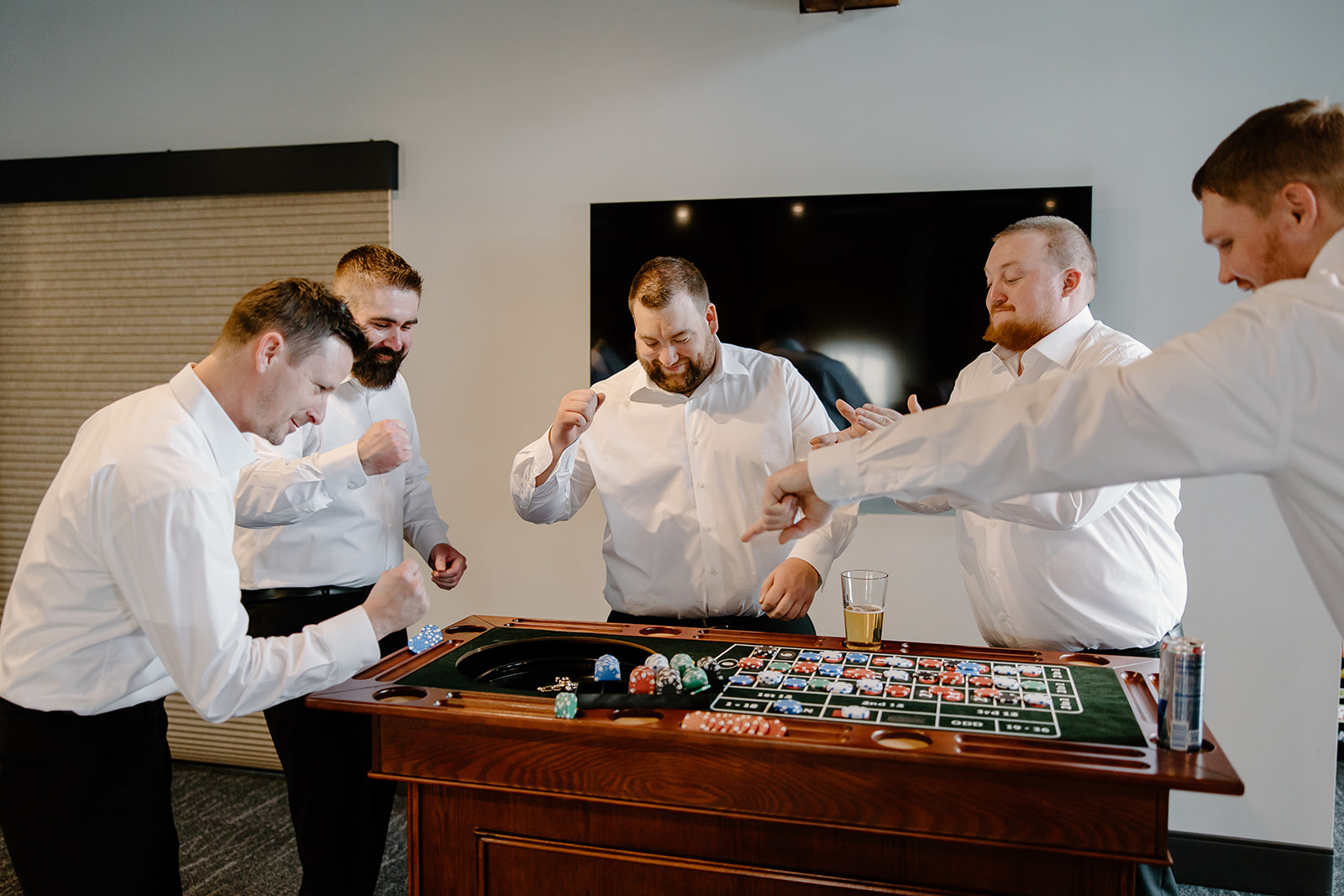 Groom hanging out with groomsmen