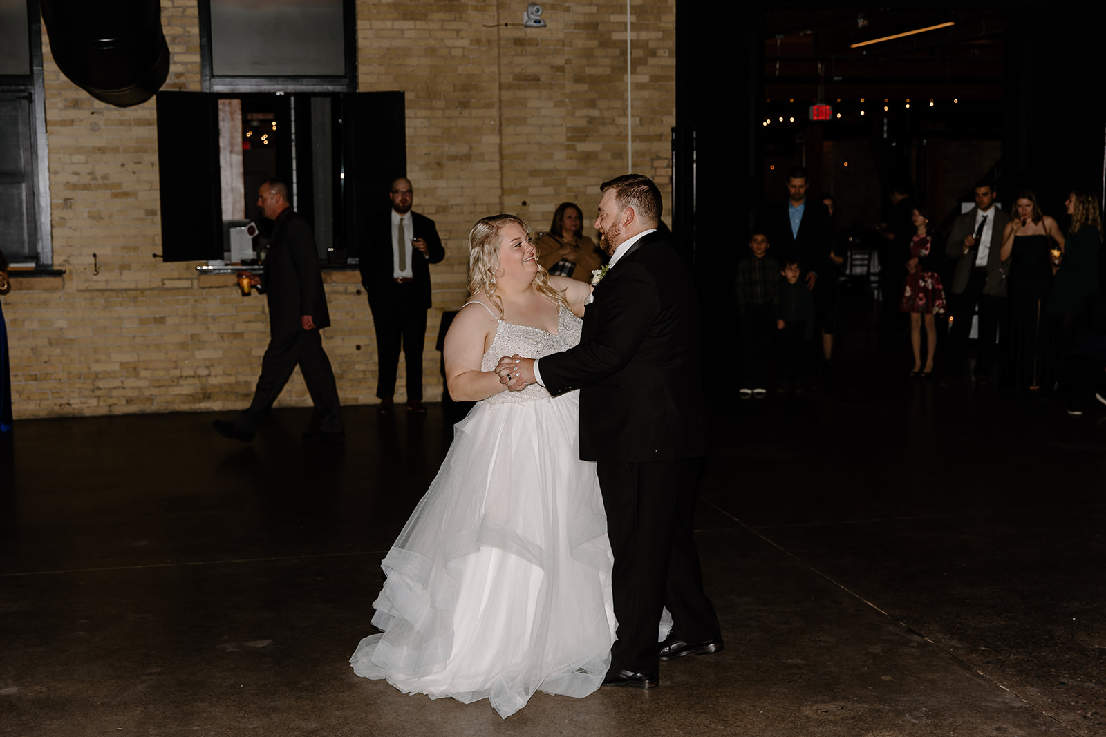 Bride and groom dance on the dance floor