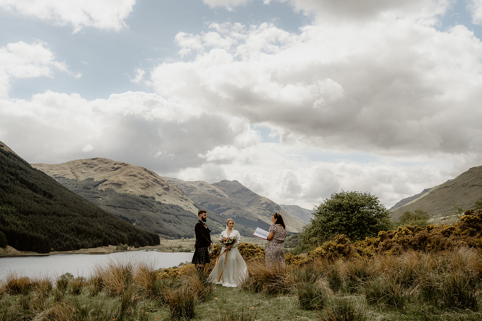 monchyle mhor elopement on the banks of loch voil. Humanist ceremony with mountains and loch in the background.