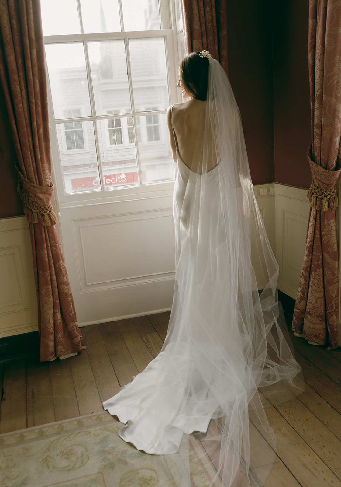 A bridal portrait in red room at the William Aiken House