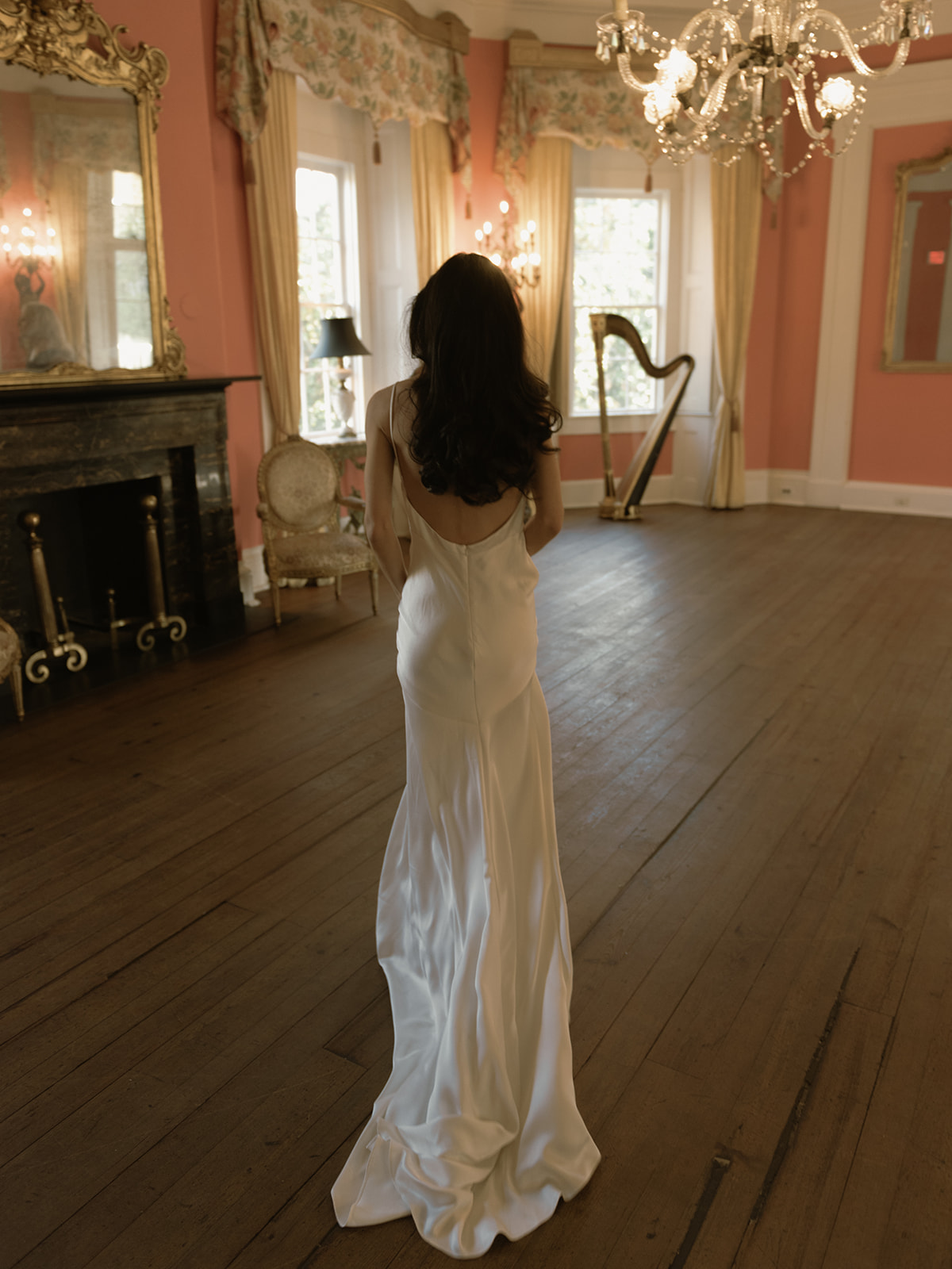 The bride walks through the William Aiken house