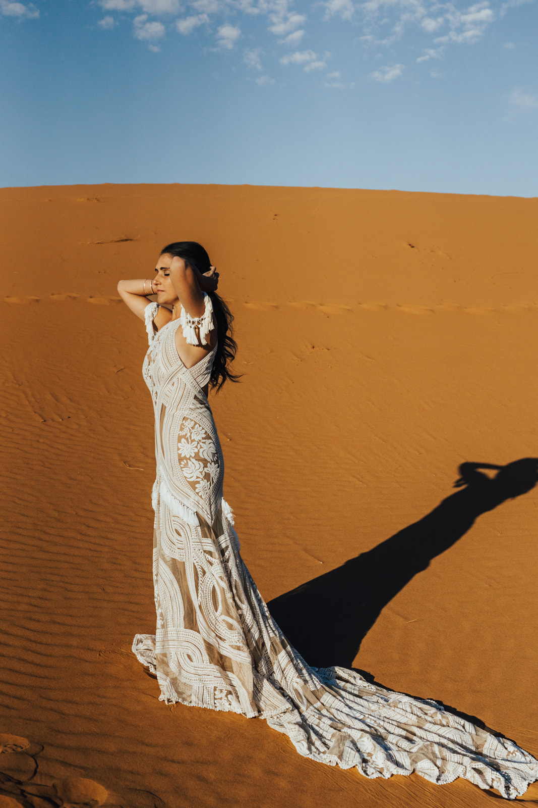 Sunrise elopement in the Sahara Desert, where to elope in the Sahara Desert wearing Rue De Seine gown