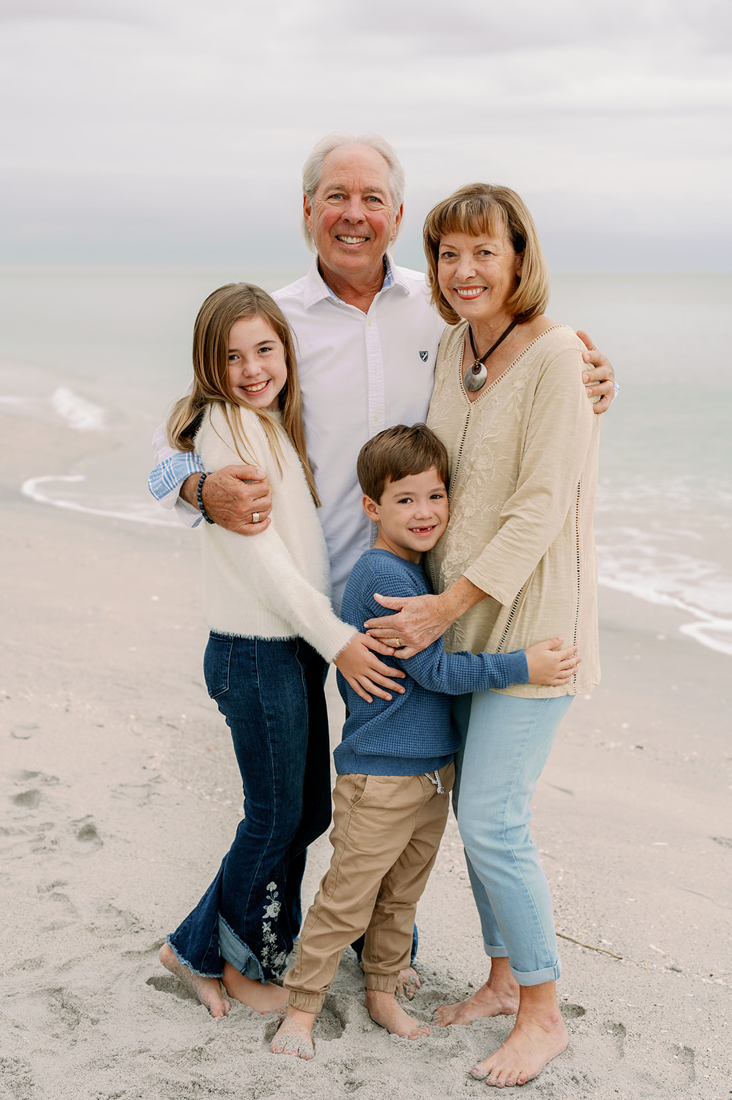 Rainy beach day family photoshoot on Manasota Key in Englewood, Florida