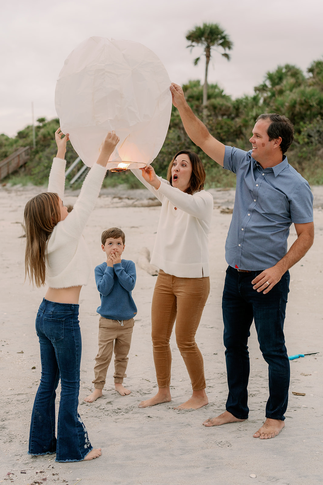 Rainy beach day family photoshoot on Manasota Key in Englewood, Florida