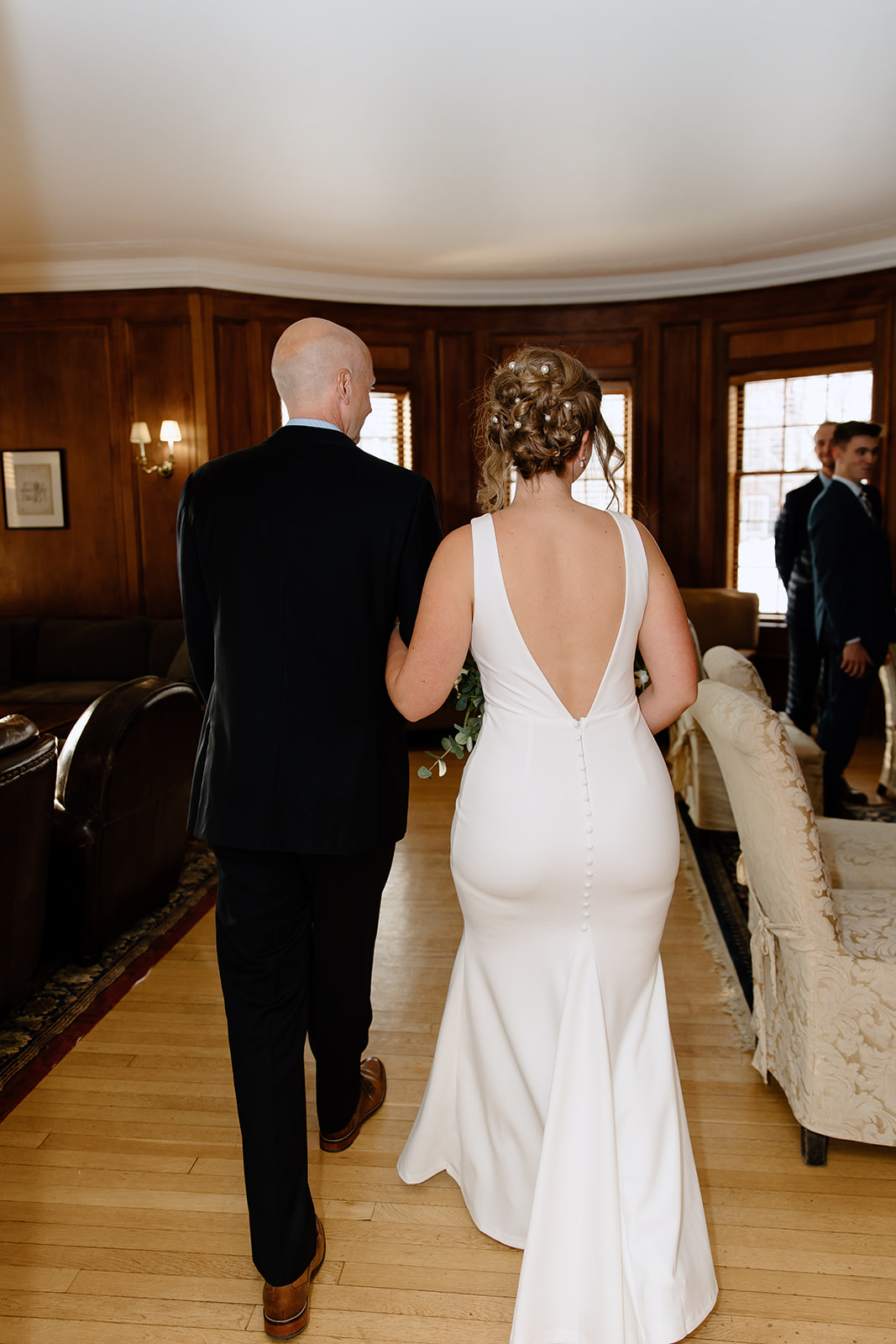 Bride and her father walking into the ceremony