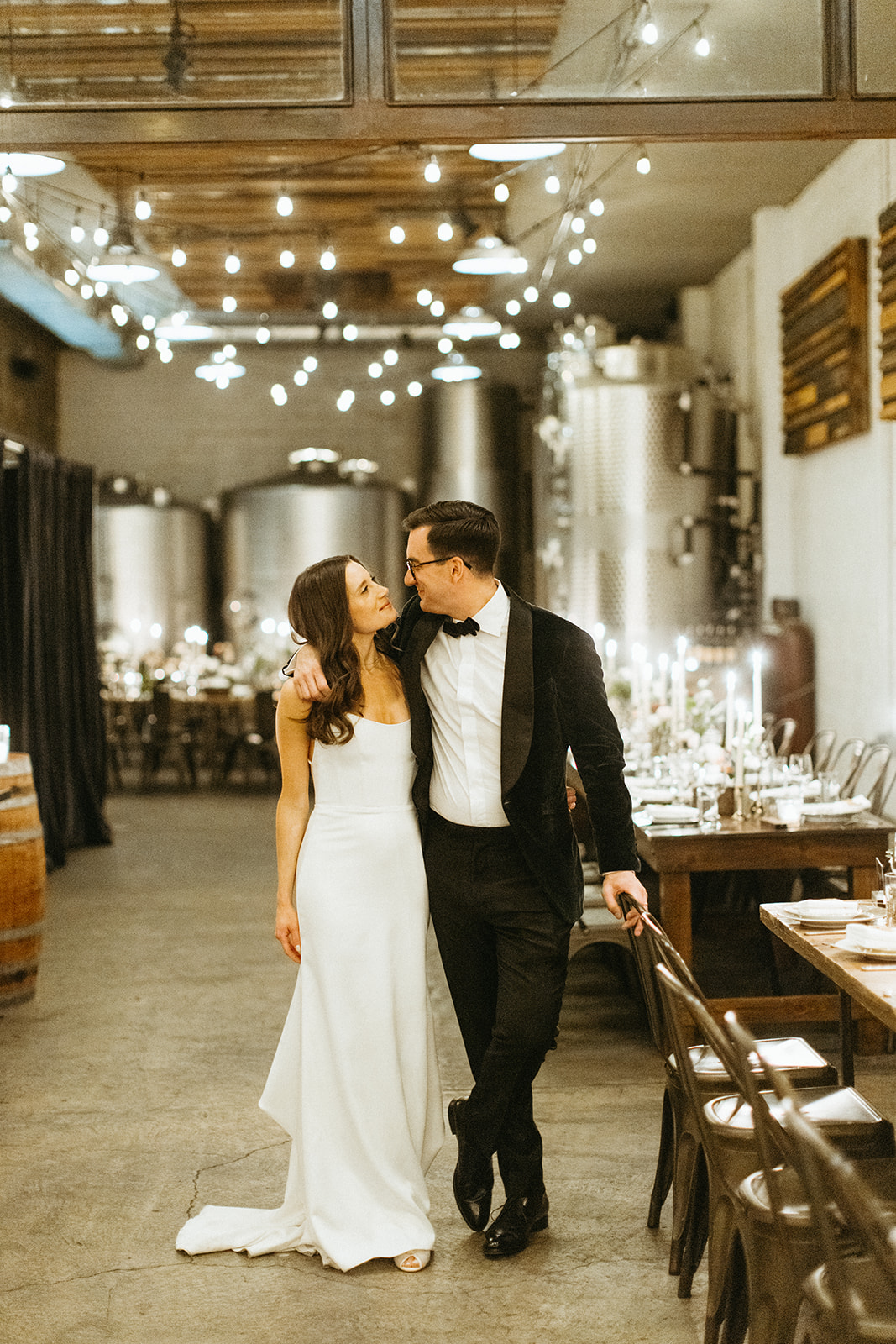 A modern and romantic candle-lit wedding with rustic-chic touches at Brooklyn Winery. Shot by Weddings by Nato
