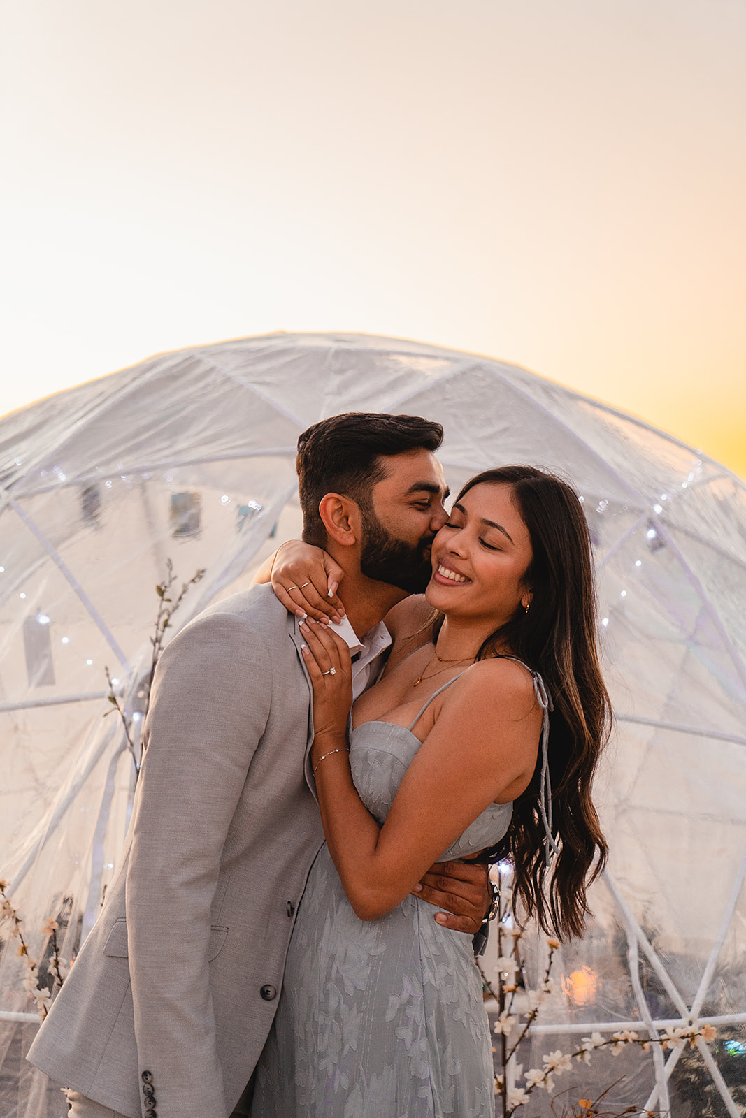 Couples share kisses for their engagement session in San Clemente