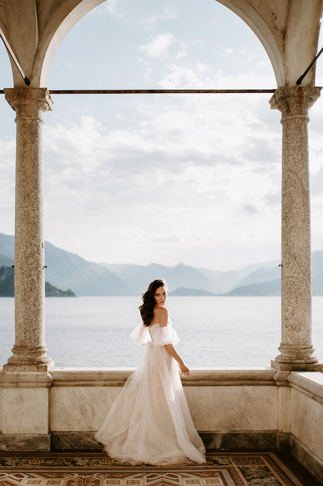 bride looking out at views of lake como
