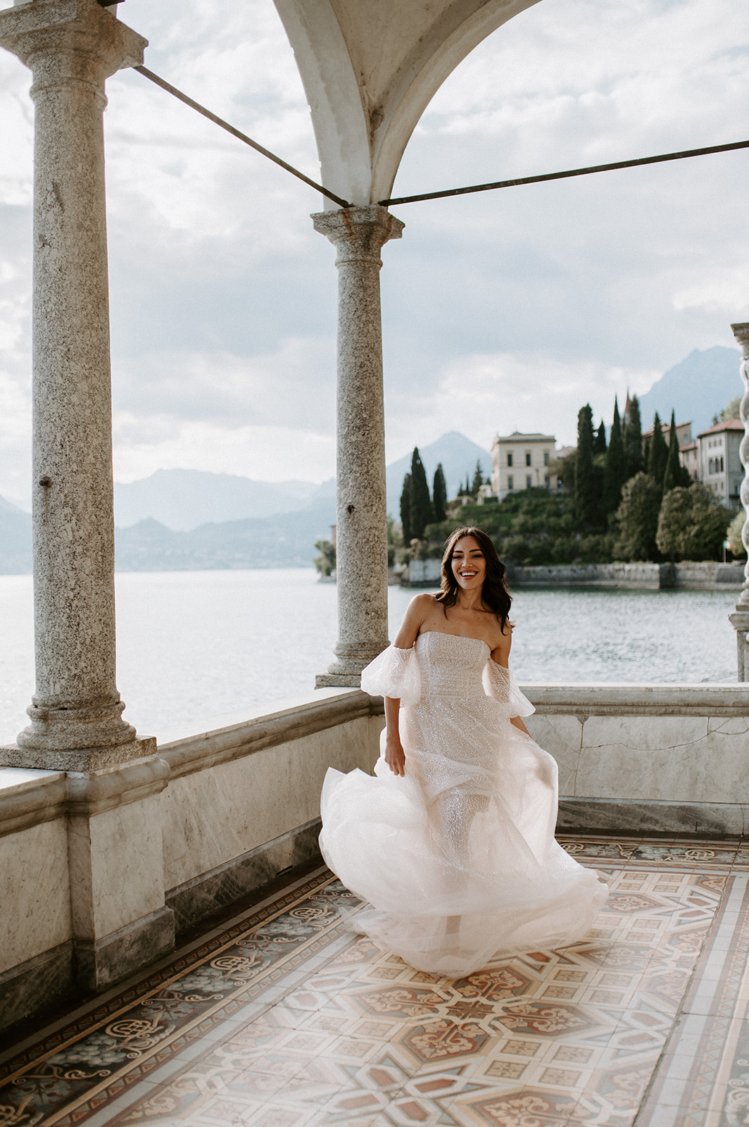 bride dancing with dress jolie by berta lake Como at villa monastero