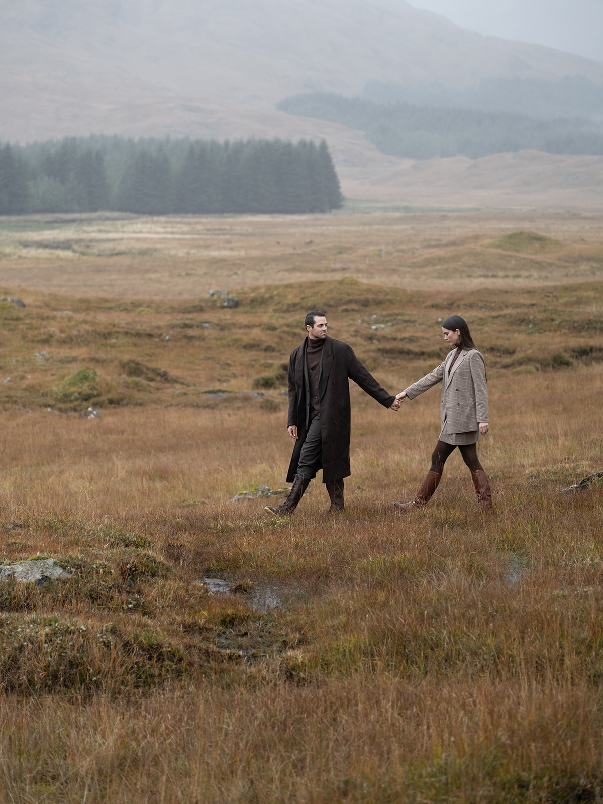 couple walking in scotland 
