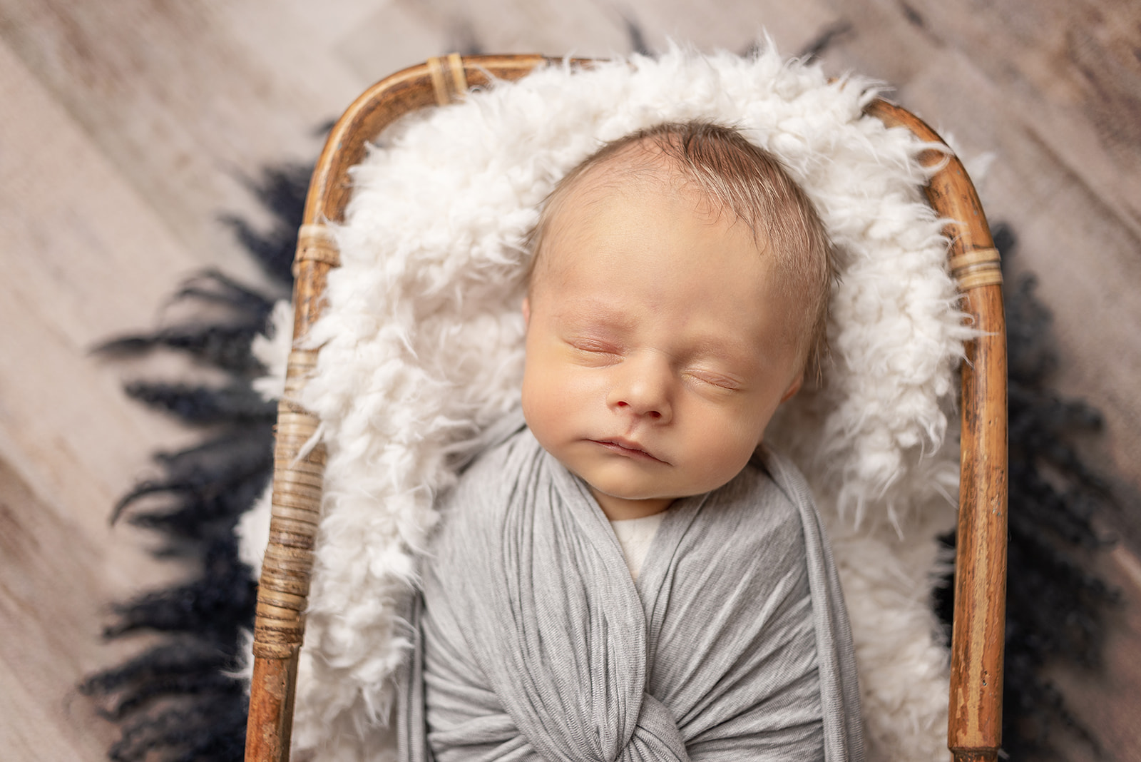 baby boy newborn professional pictures with sweet neutral colors in carthage, missouri