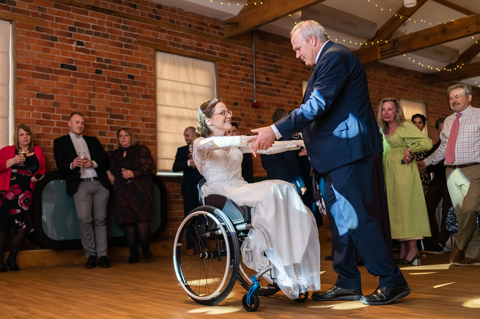 Father of the bride dance in a wheelchair
